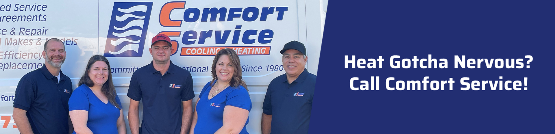 Comfort Service employees standing in front of a van with the Comfort Service blue and orange logo.